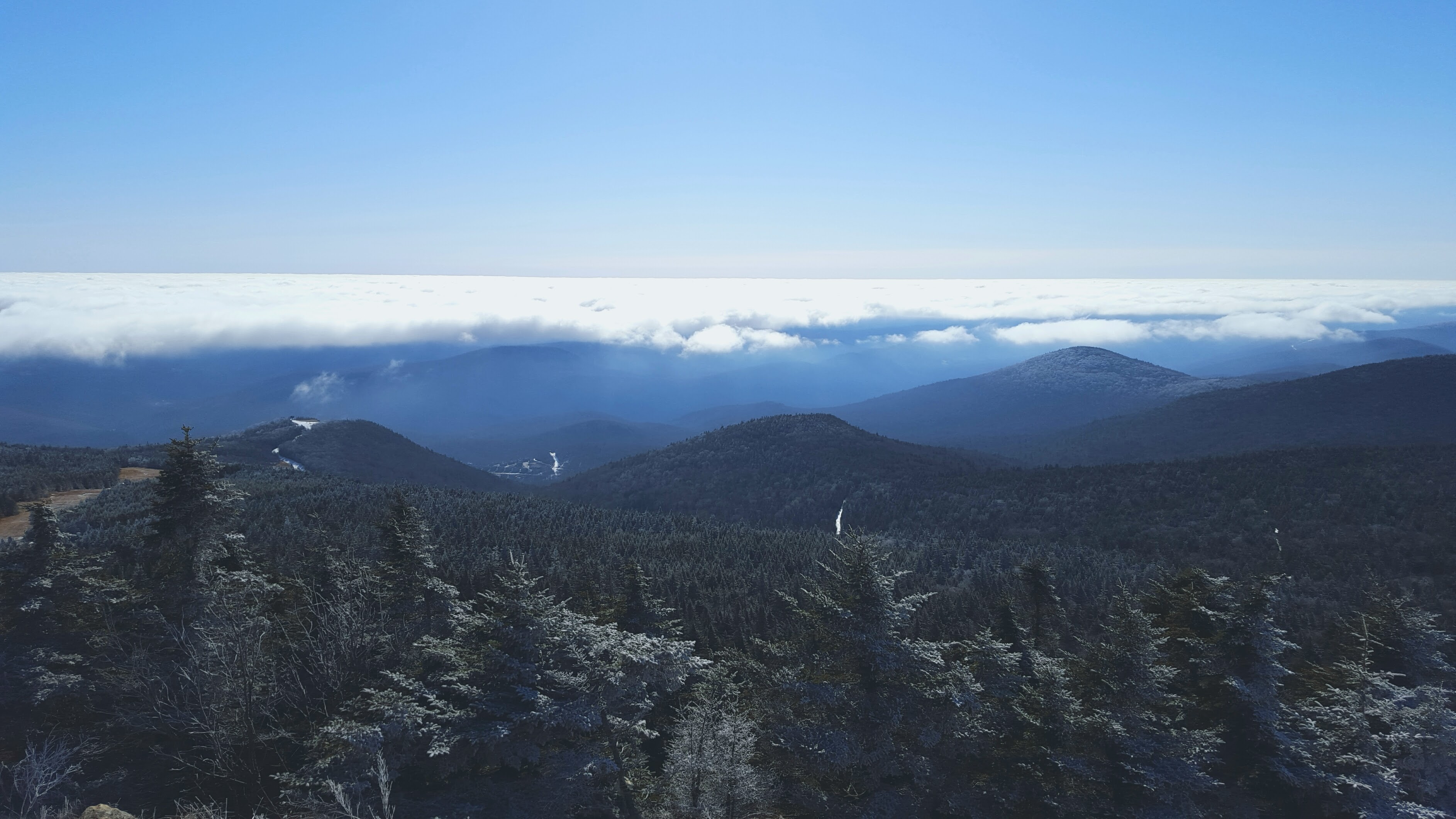 view of mountains with clouds